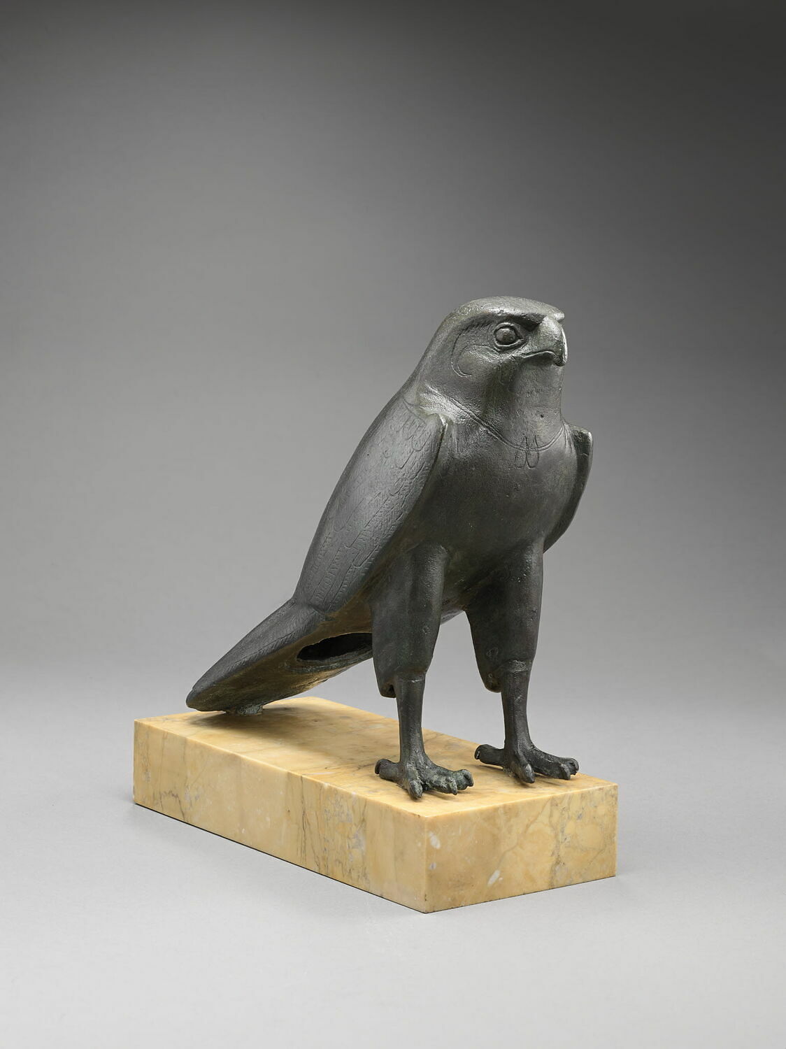 Falcon statuette/sarcophagus, 664-332 B.C., Late Period, Egypt, Bronze, H: 23 cm, L: 23.3 cm, Musée du Louvre, Paris, © 2014 Musée du Louvre, Dist. GrandPalaisRmn / Benjamin Soligny 