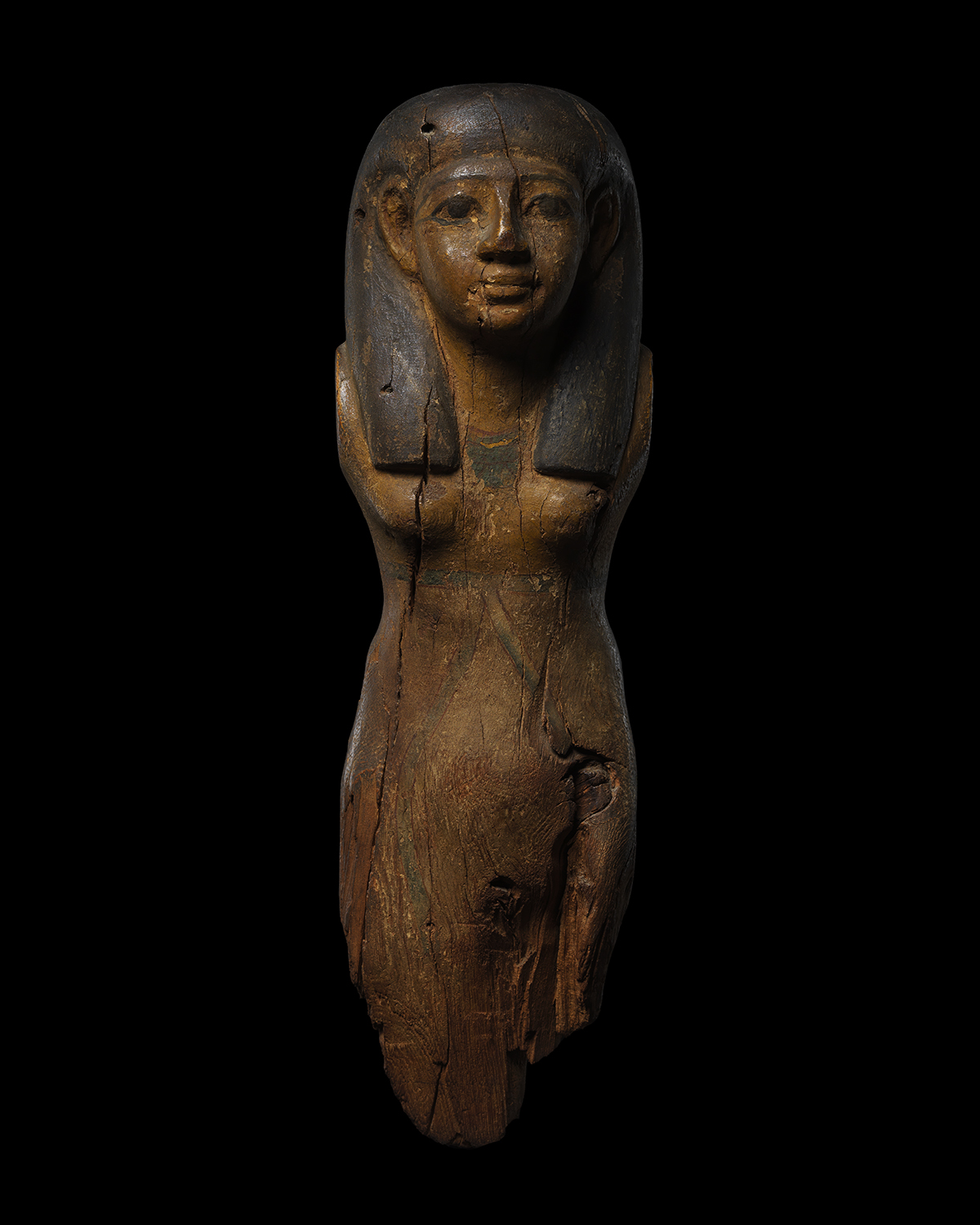 Statue of a Female Offering Bearer, Late 11th- Early 12th Dynasty, Middle Kingdom, Egypt . Image: David Brunetti
